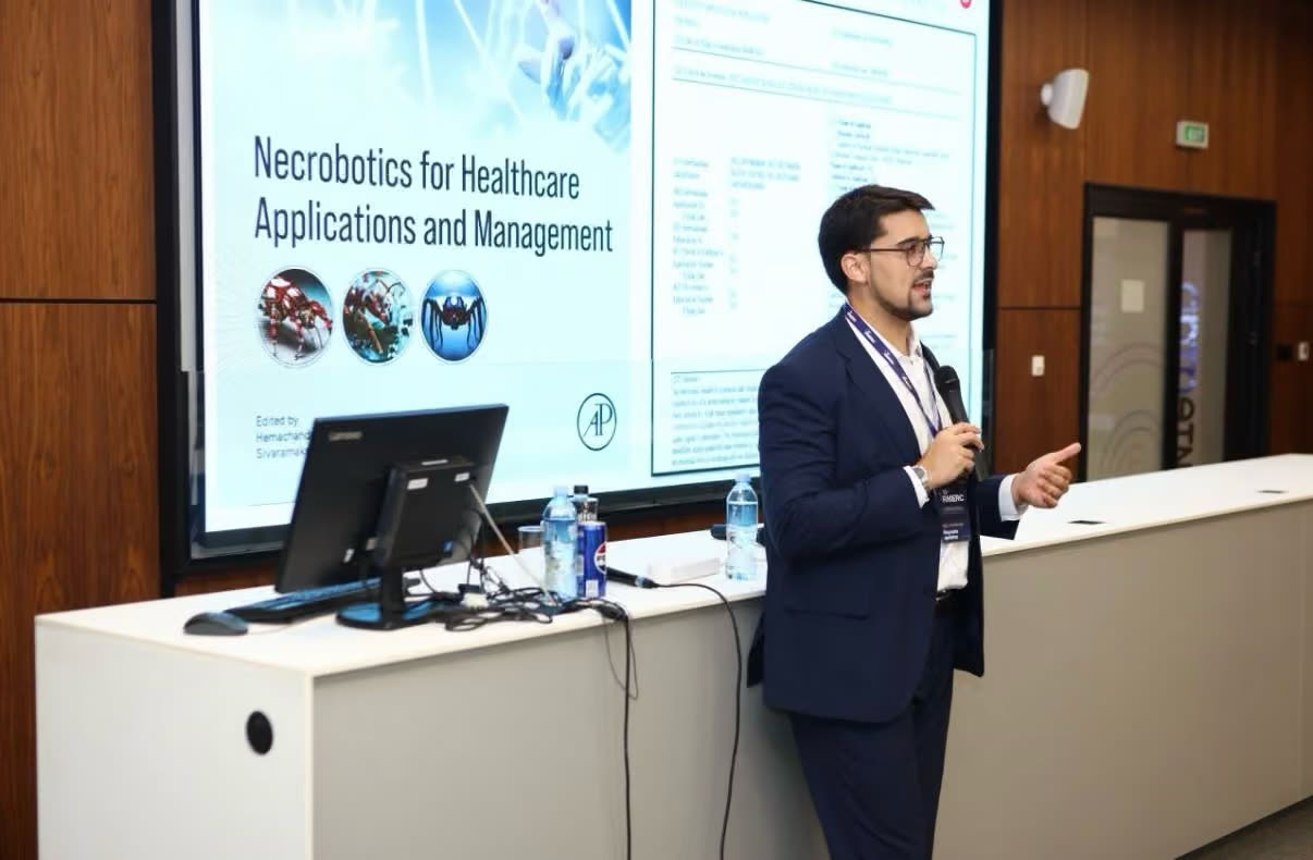 Speaker presenting a talk on AI applications in healthcare