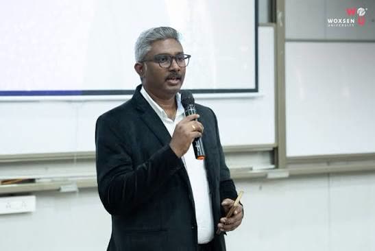 Presenter addressing delegates in a session room